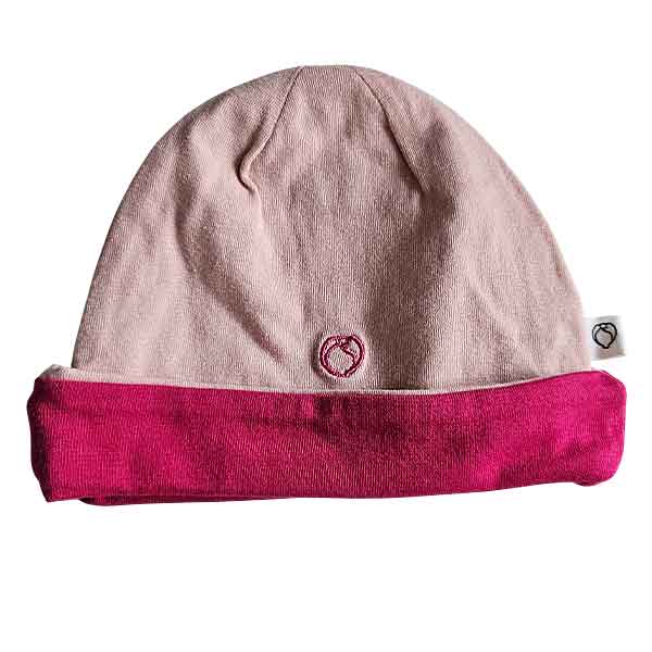 Studio Spruitje tweedehands babymutsje roze met fuchsia omslagrand van zachte jersey stof.
