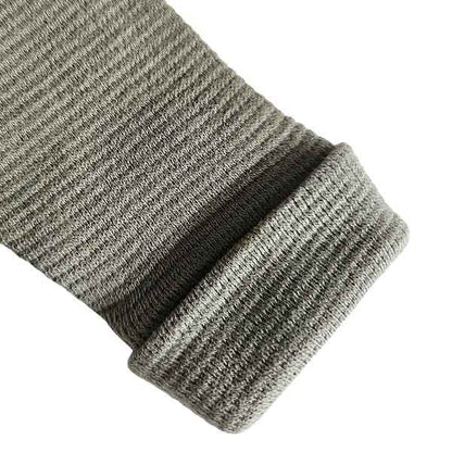 Studio Spruitje tweedehands babyshirt groen met houten knoopjes en lange mouwen.